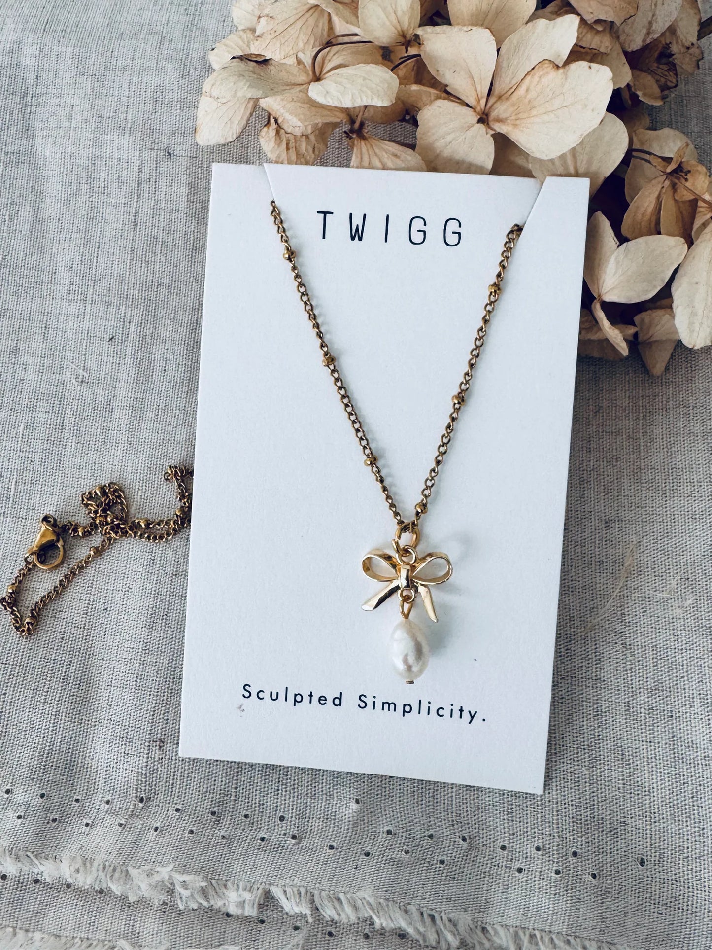 TWIGG JEWELLERY Pearl Bow Necklace